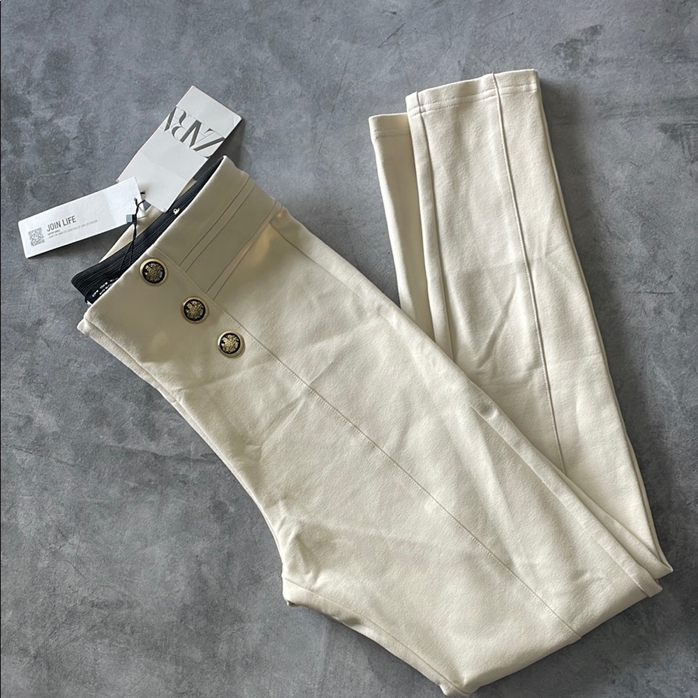 Cream High-Waisted Pants with Button Detail